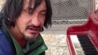 Man on the street plays beautifully