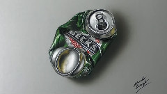A Crushed Can Of Beer